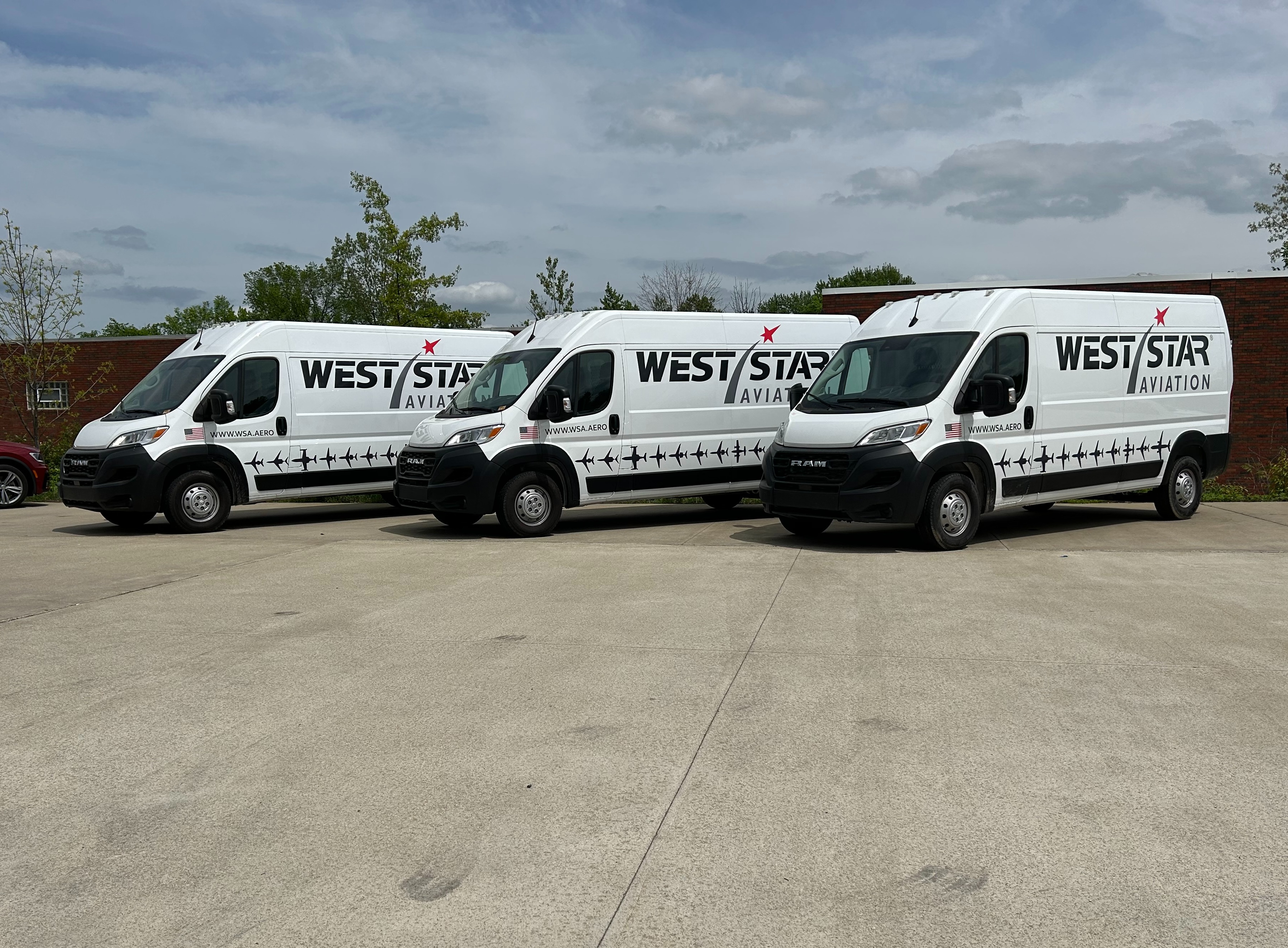 company vehicles with graphics